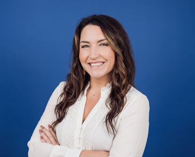 Studio-style AI headshot of the same customer, made with HeadshotPro